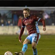 Ollie Chamberlain on the ball for Taunton Town FC.