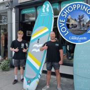 Jason (right) with his son Bailey outside their shop on Riverside Place in Taunton