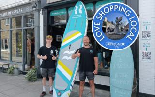 Jason (right) with his son Bailey outside their shop on Riverside Place in Taunton