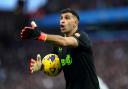 Emiliano Martinez will return to action for Aston Villa (Martin Rickett/PA)