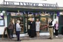 RIBBON-CUTTING: The opening of The Exmoor Stores in Exford, with Revd David Weir being given the honour of cutting the ribbon