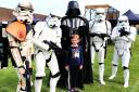 Ella Ayres-Keen with Darth Vadar and stormtroopers at Somerset Comic Con and Gaming Festival. Picture: Steve Richardson