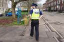 A police officer carrying out community reassurance patrols