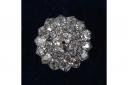 A late Victorian 29 stone diamond cluster brooch. The central old brilliant cut diamond of approximately 1.2 carats estimated, the remaining diamonds totalling approximately 2.5 carats. It is guided at £3000-£3500.