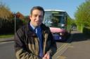 Mark Formosa is pictured outside Bishop Foxes School, Taunton, where pupils had just arrived by bus.