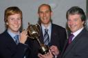 Rugby Captain and Sportsman of the Year, Tom Stokes, (left) with competitive sports manager John Palmer, and college principle, Dr Peter Avery, presenting the Colborne trophy.