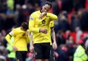 Joleon Lescott reacts after Aston Villa’s defeat at Manchester United confirmed their relegation (Martin Rickett/PA)