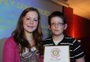 George Ward is pictured collecting his award from Karen Covey