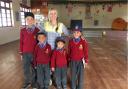Himalayan Children founder and trustee Gail McAllister with children in sponsored education in Ladakh. Picture: Taunton Vale Inner Wheel