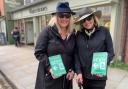Livvy and Chrissie outside the Waterstones store in Wells with their book