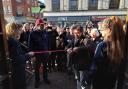 Richard Hammond cuts the tape to open the museum, with Pat Hawkins on his right. Picture: County Gazette