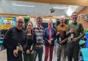 The winning team from left to right are: Michael Butcher (1st Horn player), Jodie Watson  (Soprano Cornet player & chairman), Kevin the quizmaster, Mary Rhodes (Twinning Society Chairman), Mark Tranter (Flugel Horn player) and Niall Watson (Band M.D.)