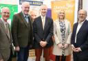 Gideon Amos (centre) thanked Melissa Whittaker (second from right) of Cash Access UK and the town council for getting the new Banking Hub open. They are pictured with, from left, Dr Harry Yoxall, David Northey and Cllr Keith Wheatley