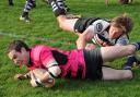 RUGBY: Justin Harris scores for Minehead Barbarians in their win at Bristol Barbarians.