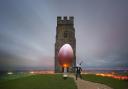 EGG-CELLENT: Beau Bunny and his giant Easter Egg levitating near Glastonbury Tor in Somerset