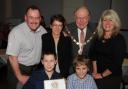 Mathew is pictured, front left, at the awards with Mason and parents with Cllr Alan Gloak