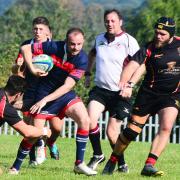 CHARGE: Wiveliscombe fly-half George Rowe in action against Chard. All pics: Steve Richardson