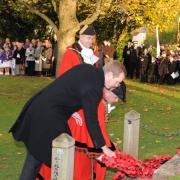 Taunton MP Jeremy Browne lays a wreath in Wellington on Sunday