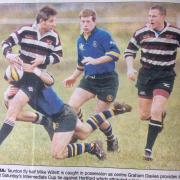 SNARED: Taunton’s Mike Willett is tackled, with Graham Davies up in support