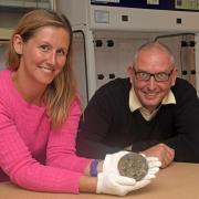 Dr Lucy Shipley and Iain Sansome with the ancient brooch. Picture: South West Heritage Trust