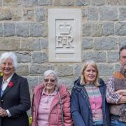 The new plaque and members of the council.