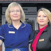 Practice sister Caroline Cornell and senior receptionist Amanda Foster outside Victoria Gate Surgery. Picture: County Gazette