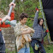 Ben Whishaw getting into character on the set of Good Boy at Worthy Farm.