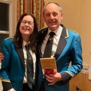 Pete Owen receiving his awards from Band Chairman Jodie Watson