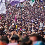 Crowds watch Foo Fighters perform on the Pyramid Stage at Glastonbury Festival 2023.