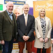 Gideon Amos (centre) thanked Melissa Kite (second from right) of Cash Access UK and the town council for getting the new Banking Hub open. They are pictured with, from left, Dr Harry Yoxall, David Northey and Cllr Keith Wheatley