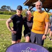 Linda (centre) with her daughter Mylena and her son-in-law Gary at the Taunton Park Run
