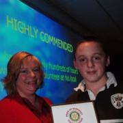 Award: Luke Pegler is presented with his award by Orchard FM's  News Editor Nicola Maxey.