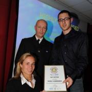 Guy Potter is pictured receiving his award from Lucy Shuker and Damian Kearney, of Avon and Somerset Police.