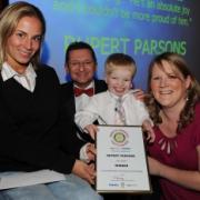 Rupert Parsons is pictured receiving his award with, from left, Lucy Shuker, Ken Bird and Franchesca Parsons.