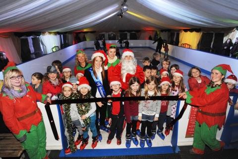 Our Face of Somerset competition winner Megan Bessell opens the ice rink.