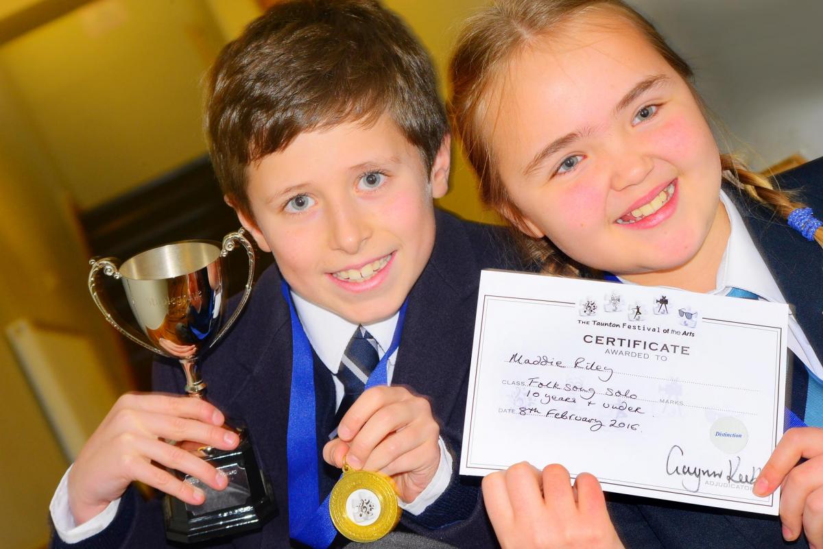 Magnus Larsen, winner of the Vocal Solo, Girl or Boy, 10 years and under, Staplegrove Cup and Maddie Riley, winner of the Solo Folk Song, 10 years and under category