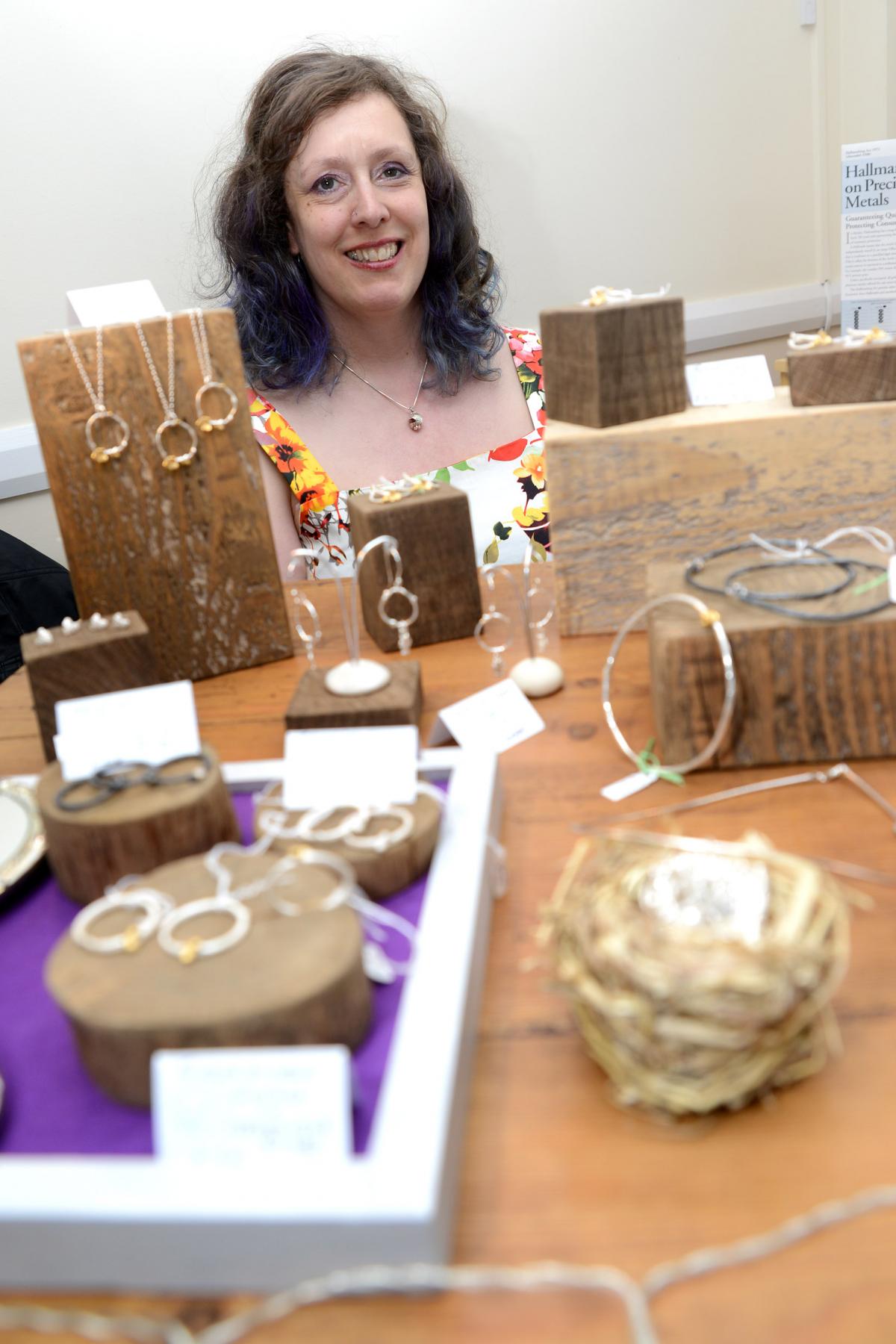 JEWELLERY: Razale Scott Olivier with her handmade items from Flambeaux Jewellery