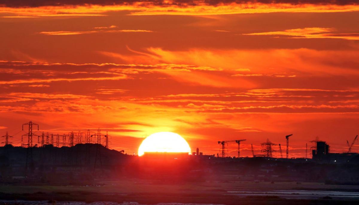 GLOW: Sunrise over Hinkley Point. PICTURE: Paul Silvers. PUBLISHED: September 7, 2017.