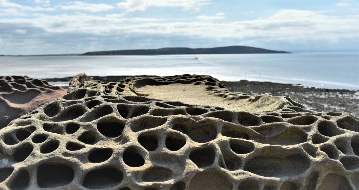 A sandstone sea wall at Weston super Mare, by Andy Linthorne