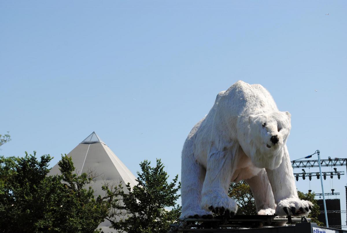 A polar bear sits on a shipping container in the backstage area of the 2019 Glastonbury Festival. Picture: Paul Jones