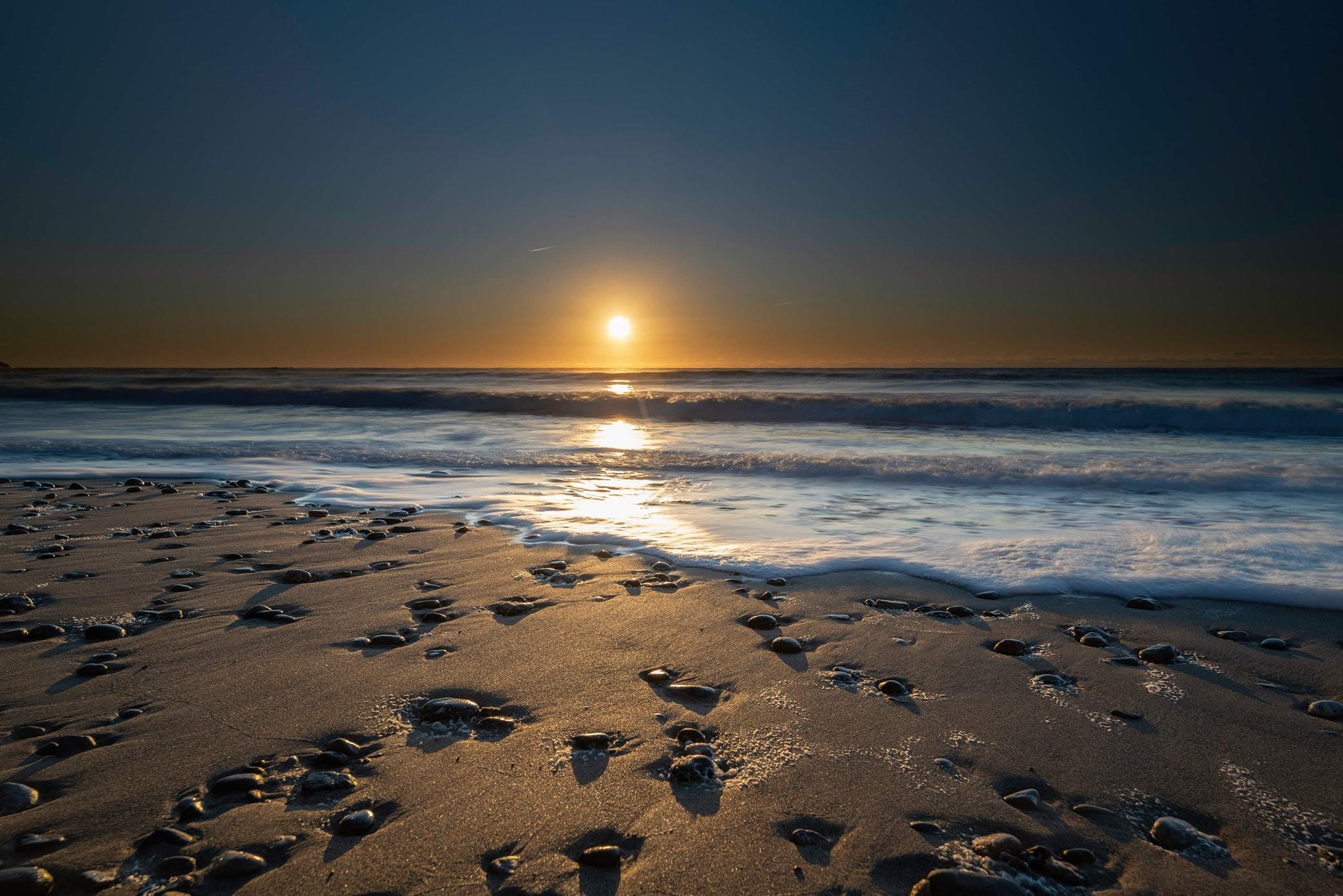 Beach sunset, by Steve Brickstock
