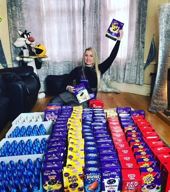 Mrs Galaxy, Dionne John, with the donated chocolate eggs