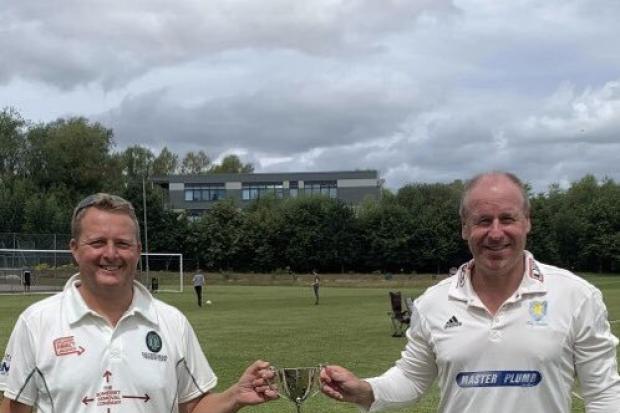 SILVERWARE: Steve Nelson, the chairman of Taunton Deane Cricket Club, left, and Kevin Parsons, chairman of Taunton St Andrews CC, with the Brice-Nelson Trophy
