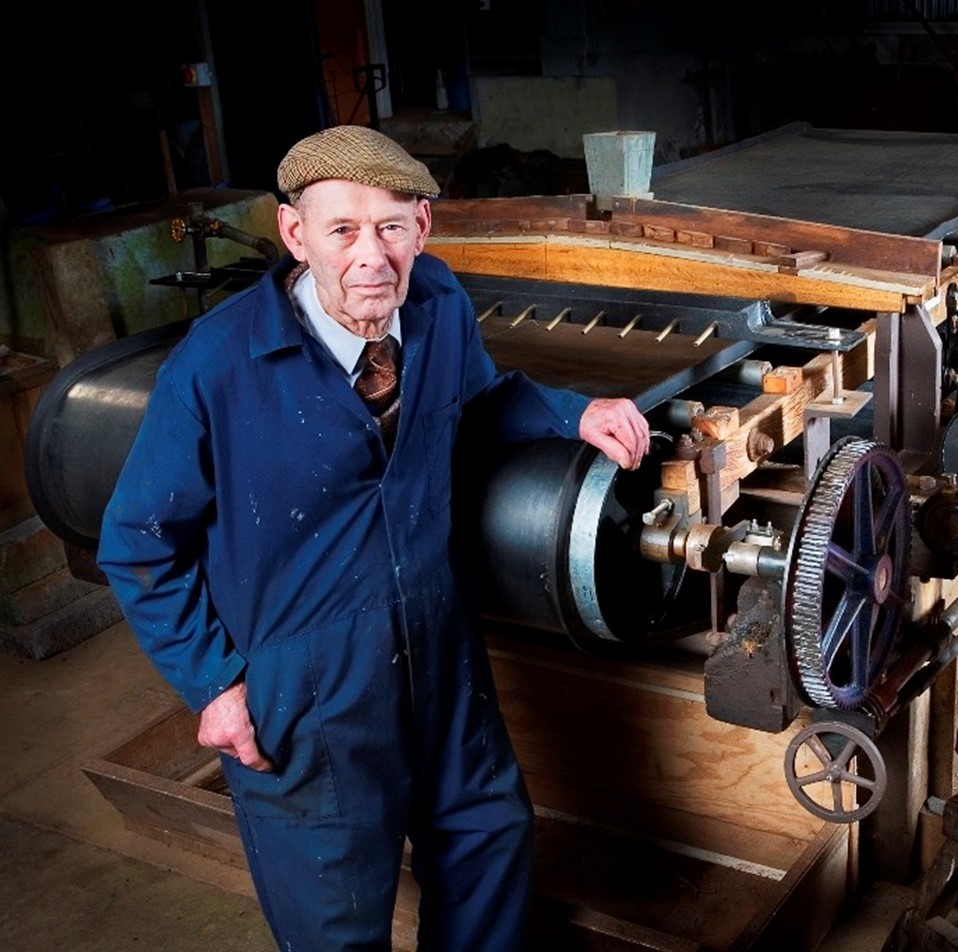 The late Willie Uren, the man behind the original rebuilding of the Frue Vanner pictured with the machine which is now fully operable
