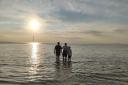 Chris Cass and his sons Dylan and Oscar in the sea at Burnham-on-Sea. Picture: Chris Cass