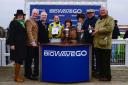Bryony Frost (jockey), The Honourable Mrs Rosemary Pease (sixth from left, next to her is trainer Paul Nicholls, and the inning connections after the 2022 Portman Cup. Picture: PPAUK