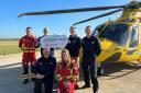 HELP Appeal presents cheque to Dorset and Somerset Air Ambulance.