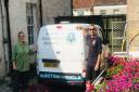 With the council's electric van are climate emergency and resilience officer Melissa Taylor and community services officer Nick Bishop. Picture: Glastonbury Town Council