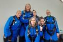 From left to right: Veronica Foley, Ciaran Jones, Jessica Rewse-Davies, Charlotte Smith, Kirsty Guymer, and David Ramsden - pictured after completing their charity skydive on Sunday November 5.
