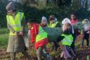 Lugging the tree back to the school. Picture: Langford Budville CofE Primary School